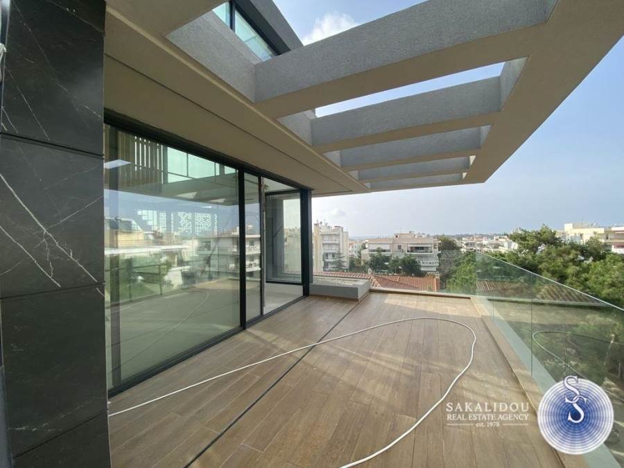 Top floor maisonette with view in Voula 